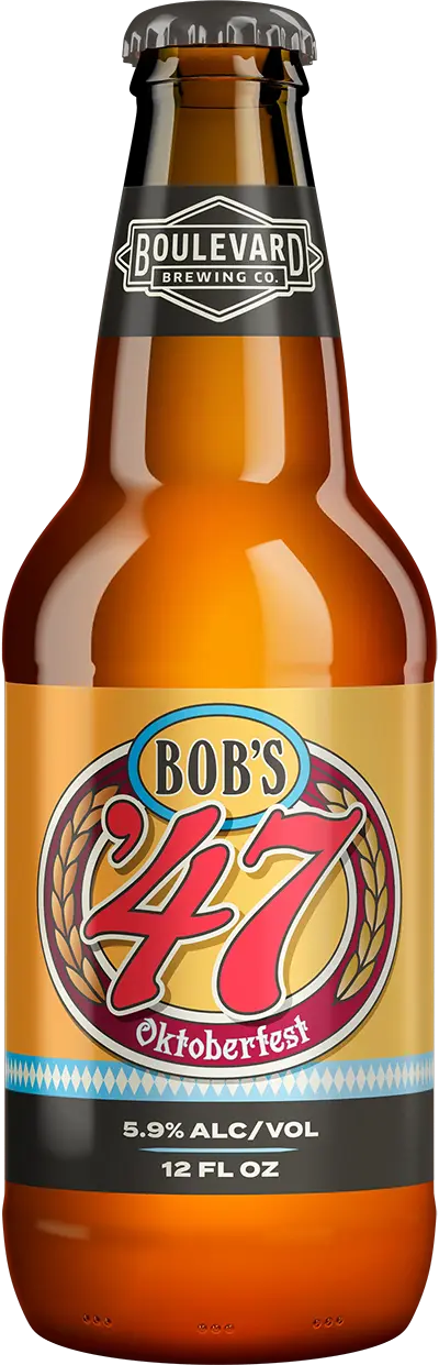 A 12 fl oz brown beer bottle from Boulevard Brewing Co. is labeled "Bob's '47 Oktoberfest." The label features red text with a blue and yellow background, decorated with a wheat motif and the beer's alcohol content of 5.9% displayed at the bottom.